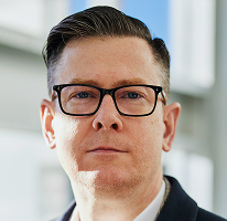 Alexander Hughes, generální ředitel kryptoměnové obchodní společnosti, portrét